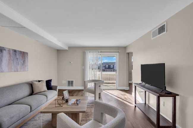 Bright living area with modern finishes at Town Bank Manor