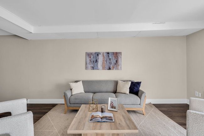 Bright living area with modern finishes at Town Bank Manor