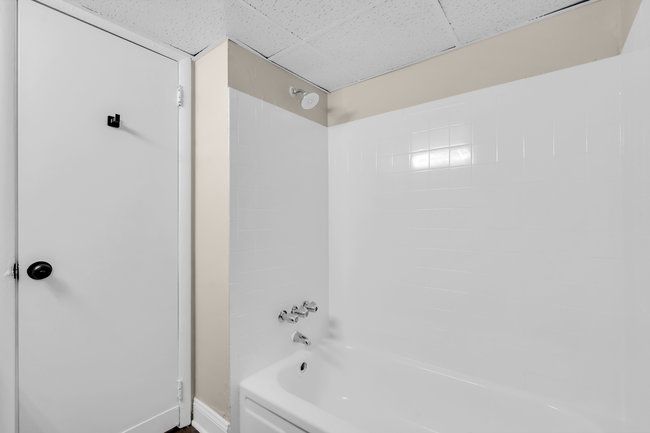 Bathroom with vanity and shower at Town Bank Manor