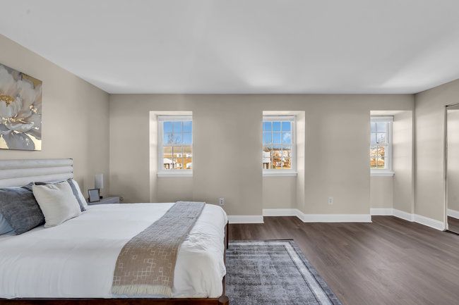 Bedroom with natural light at Town Bank Manor