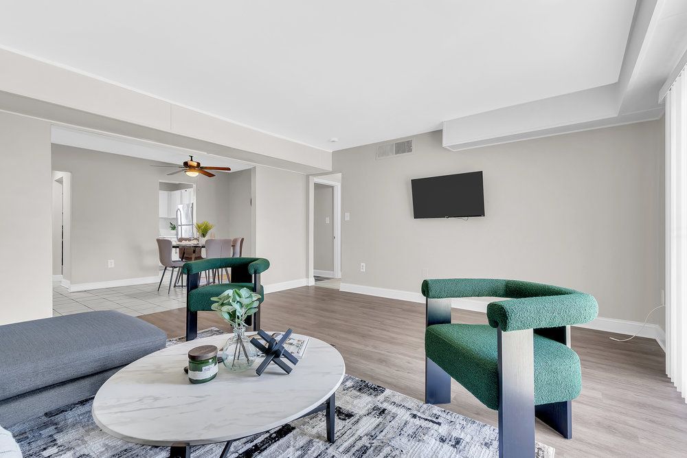 Bright living area with modern finishes at Town Bank Manor