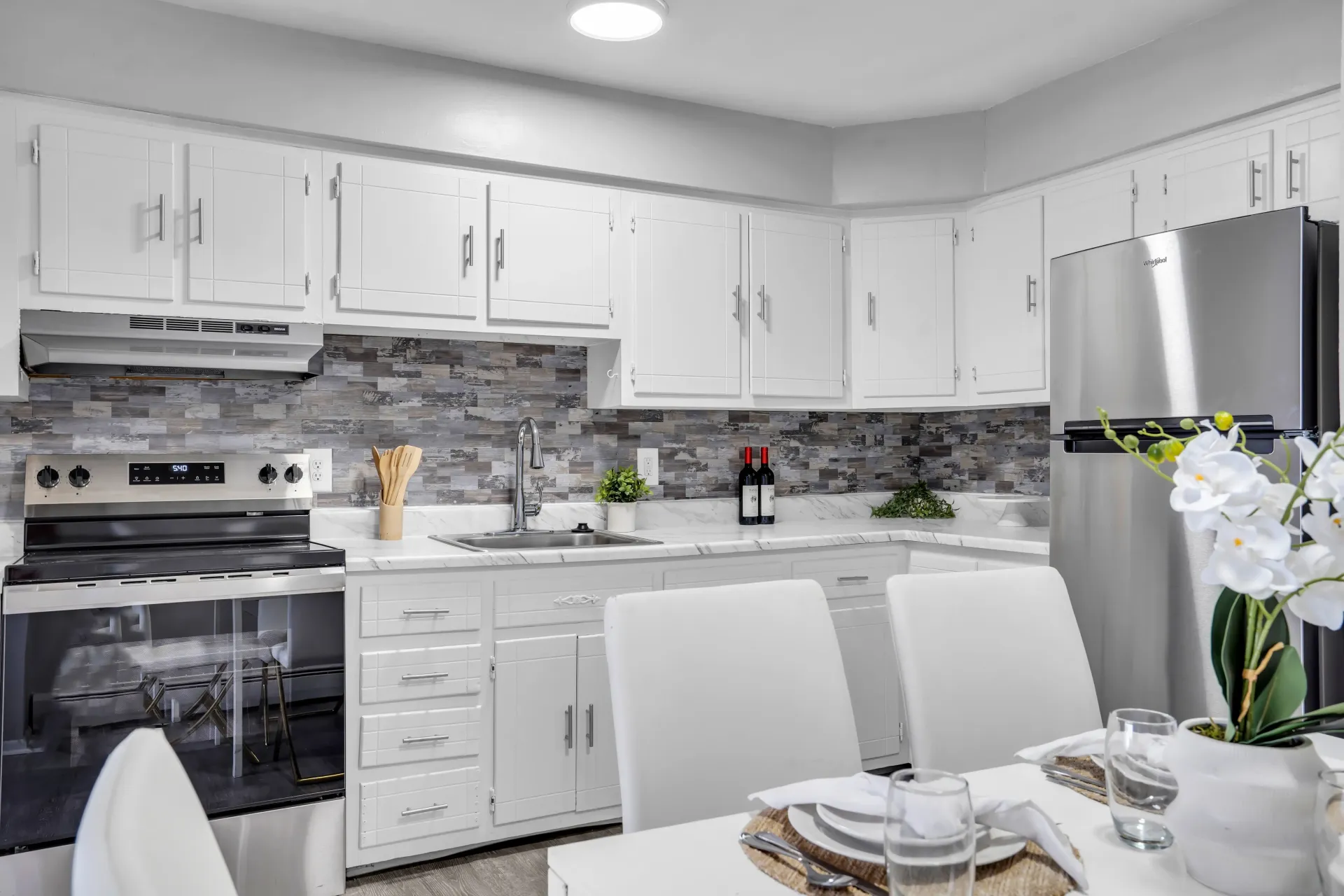 Bright kitchen with breakfast bar at Town Bank Manor Apartments in Town Bank, NJ