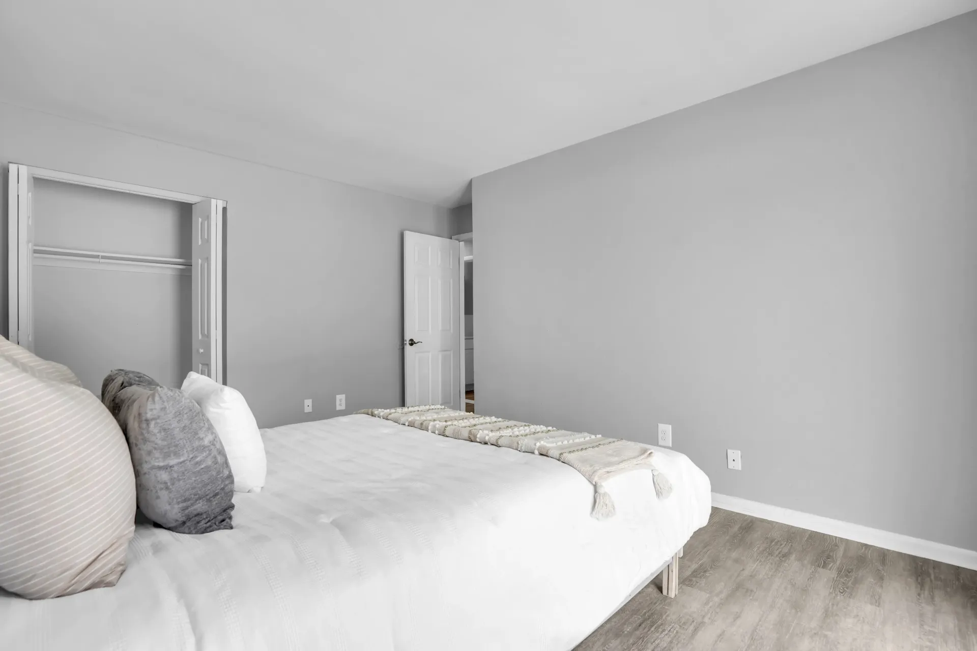 Spacious bedroom with neutral walls at Town Bank Manor Apartments in NJ
