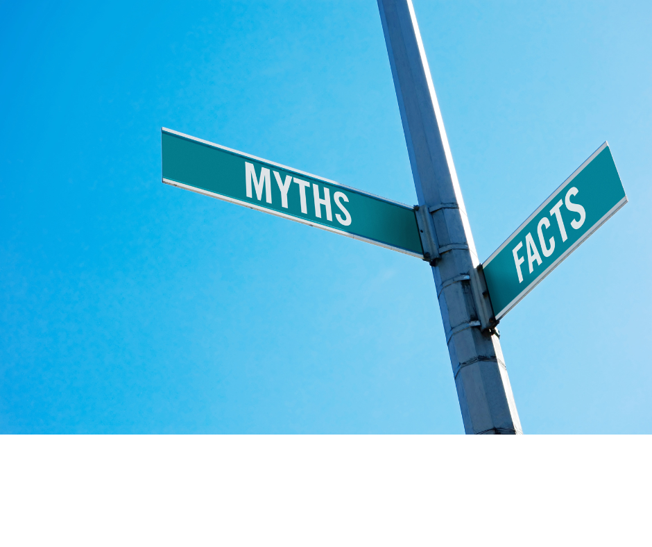 Myths and facts street signs on a pole