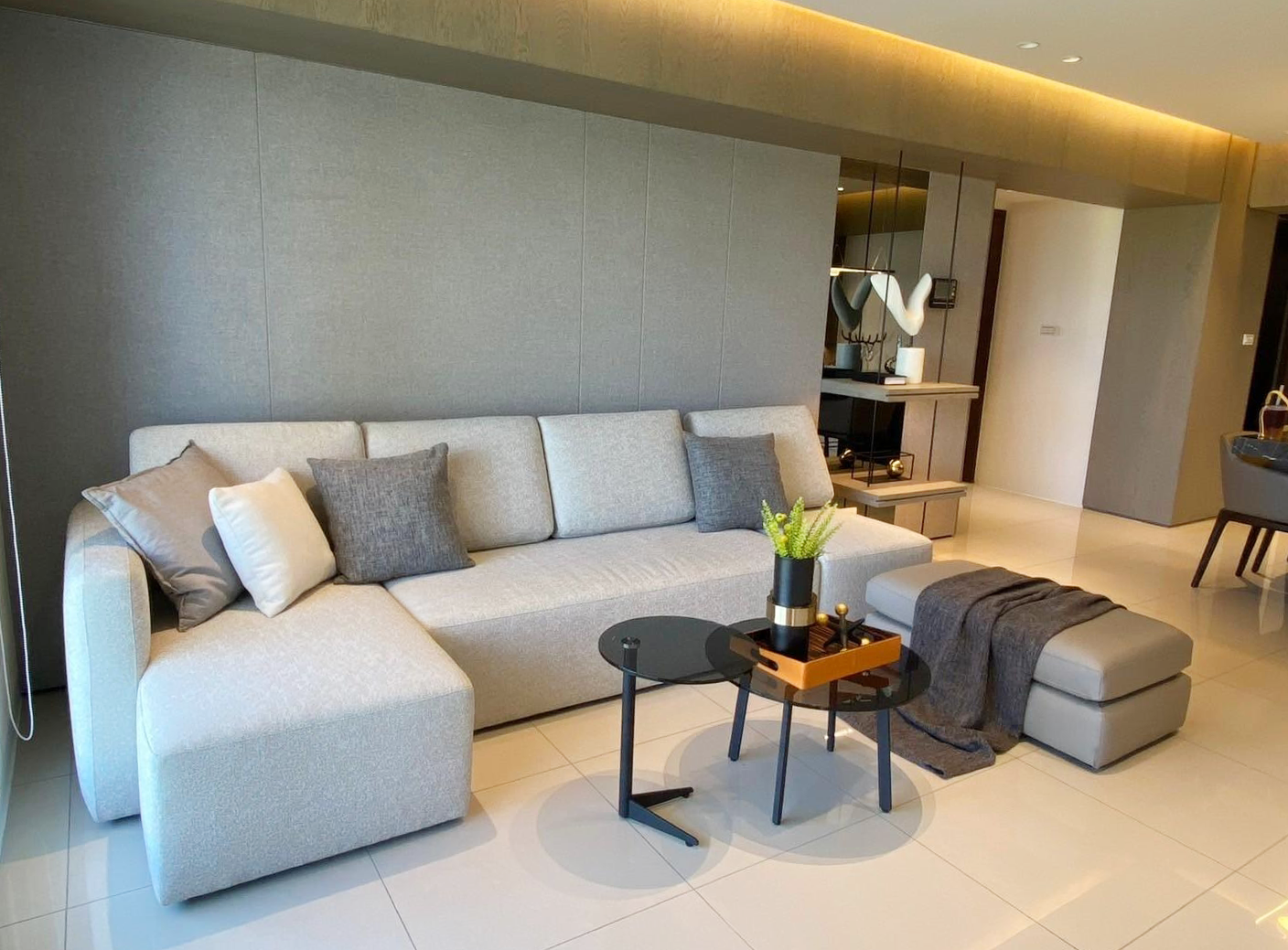 A living room with a couch and a coffee table.