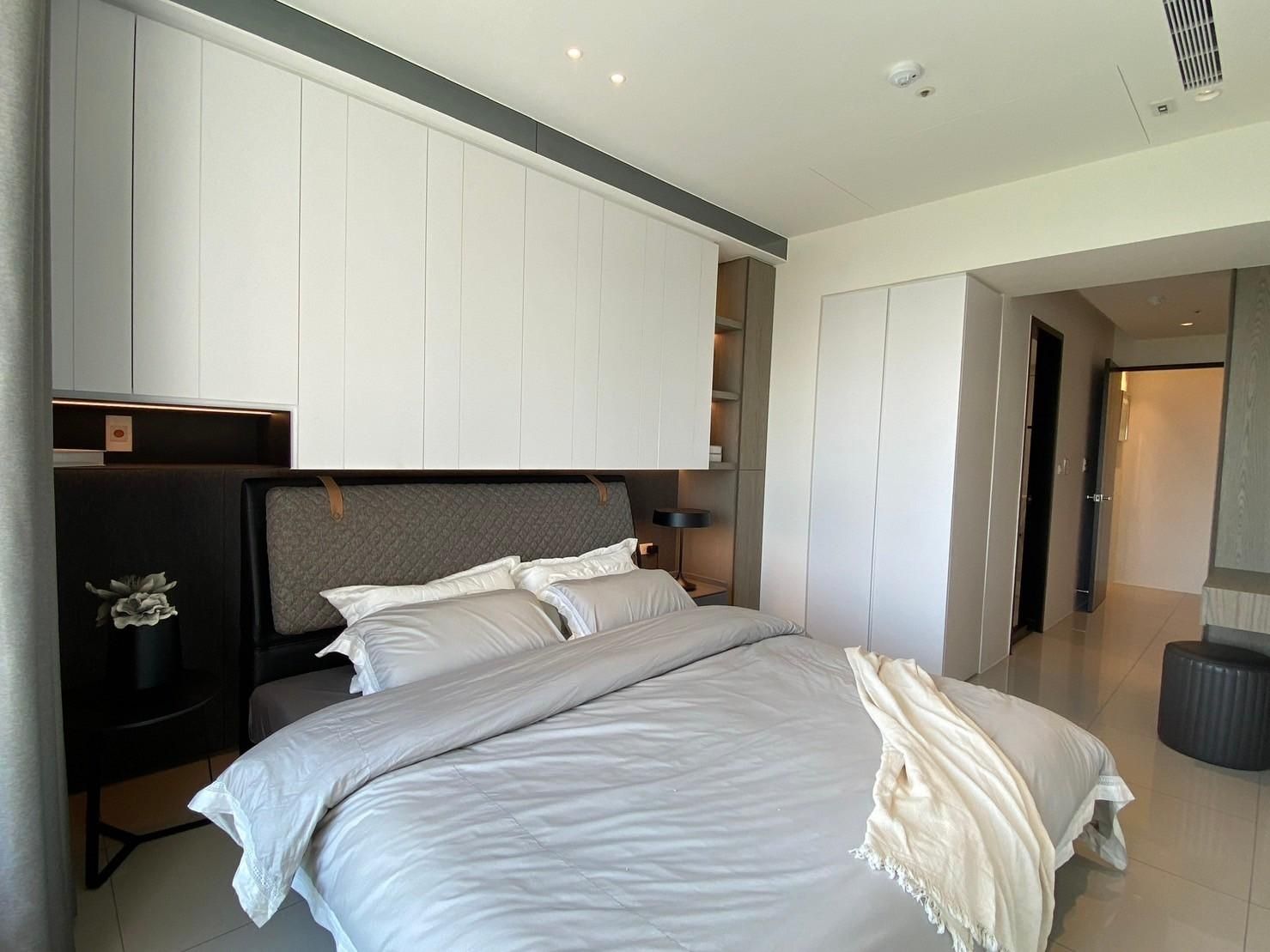 There is a large bed in the middle of the room.