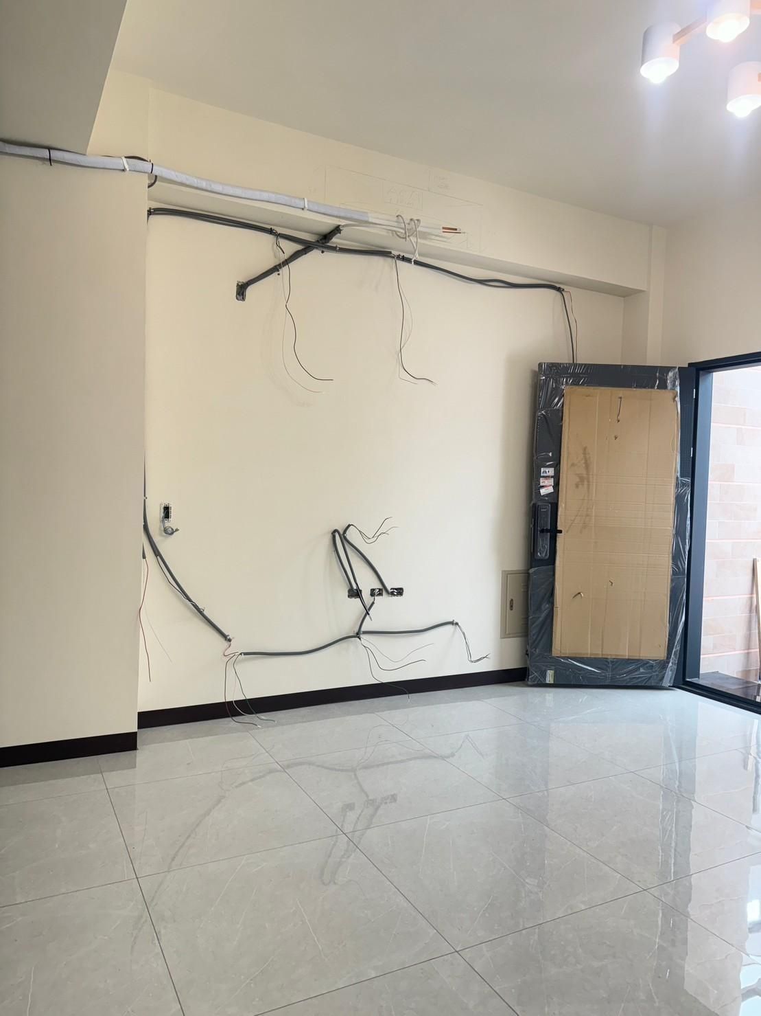 There is a door in the middle of the room.