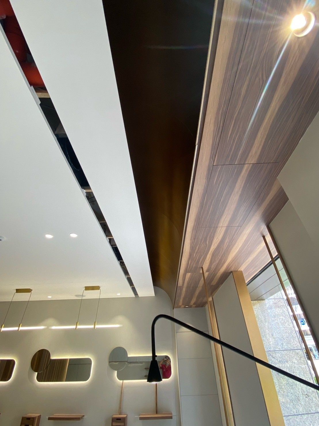 A room with a ceiling that has a light on it