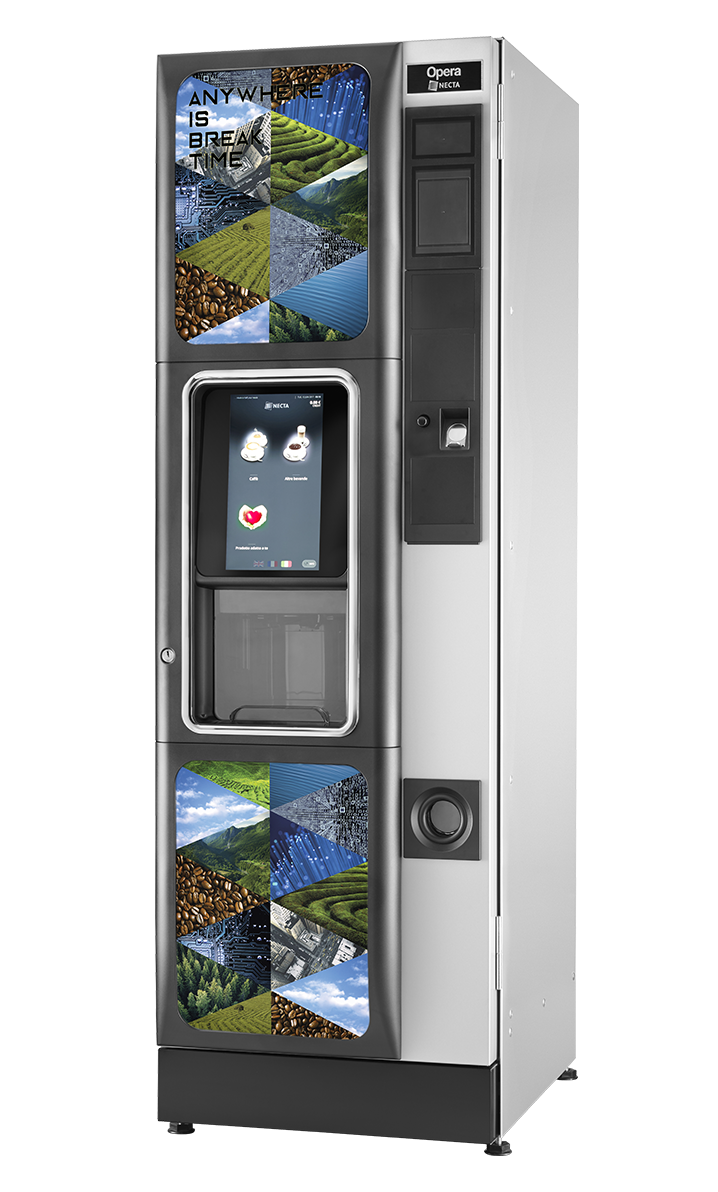 a coffee vending machine with a picture of mountains on the side .