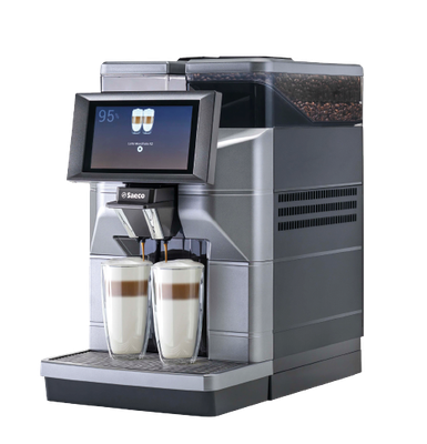 a coffee machine with two cups of coffee on it