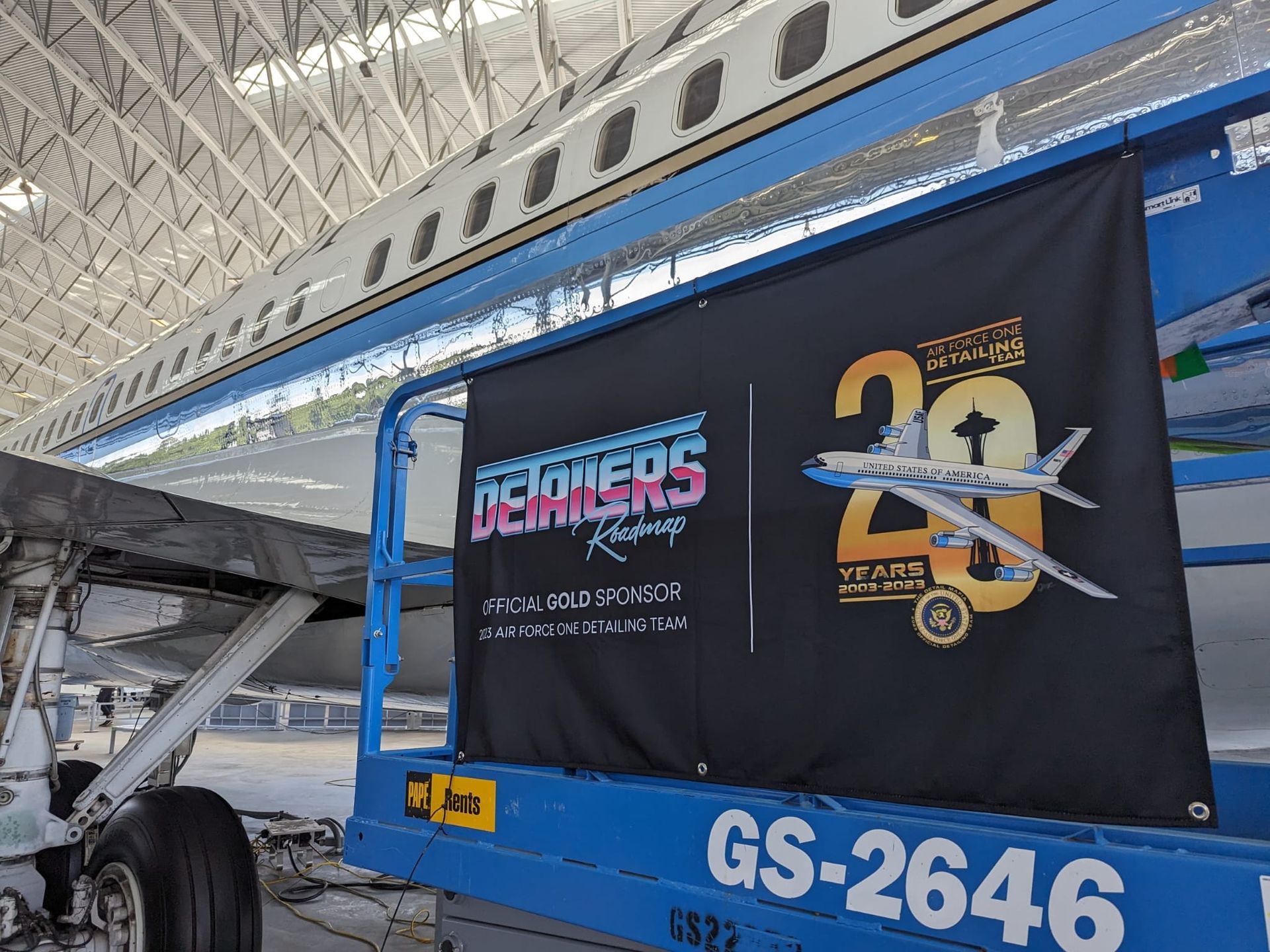 A plane with a banner on the side of it that says gs-2646