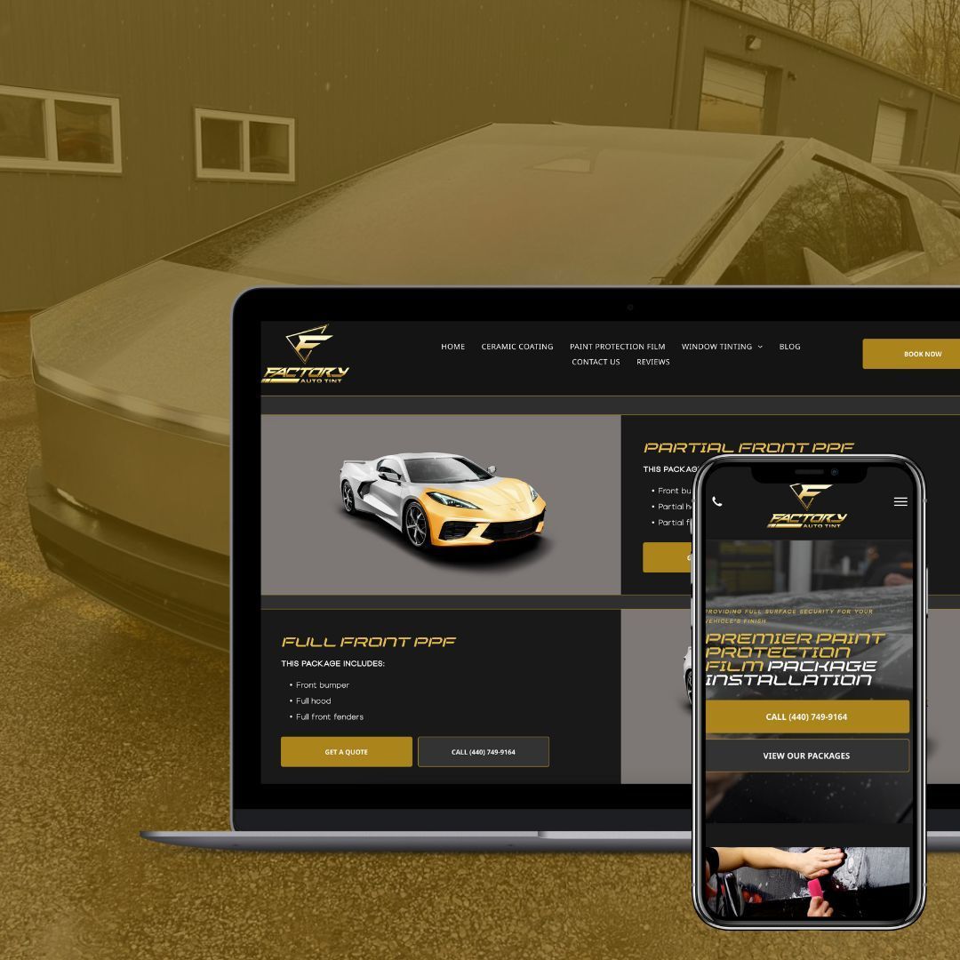 Laptop and phone displaying a website for car detailing services; a Corvette sits in the background.