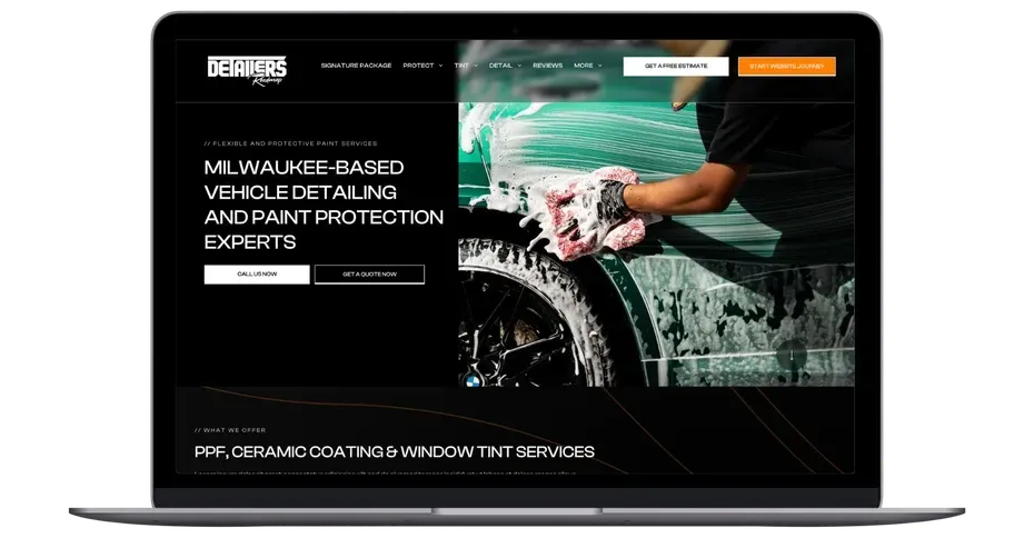 a laptop screen shows a website for milwaukee based vehicle detailing and paint protection experts .