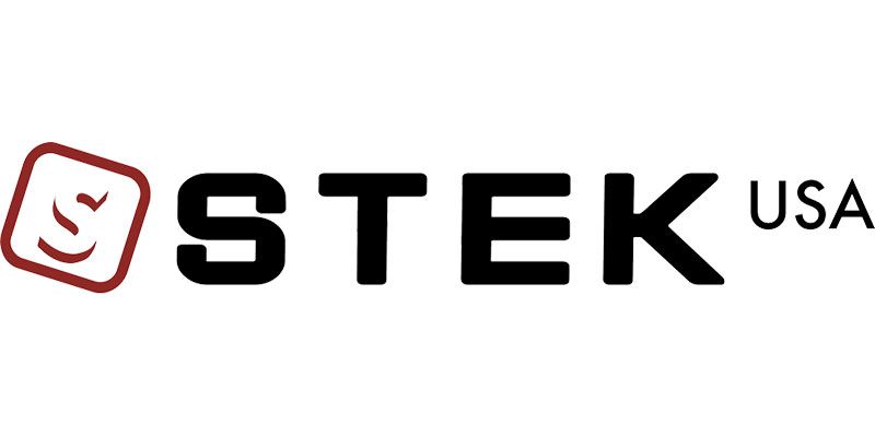 The logo for stek usa is black and red on a white background.