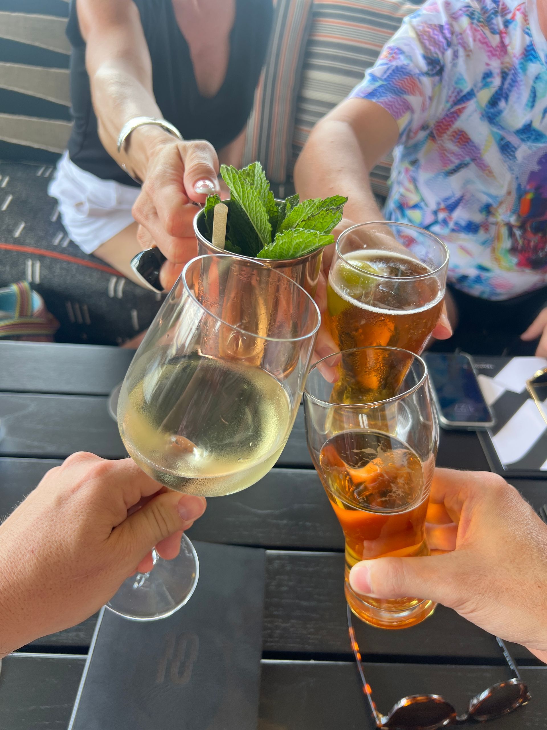 friends cheers with glasses of wine