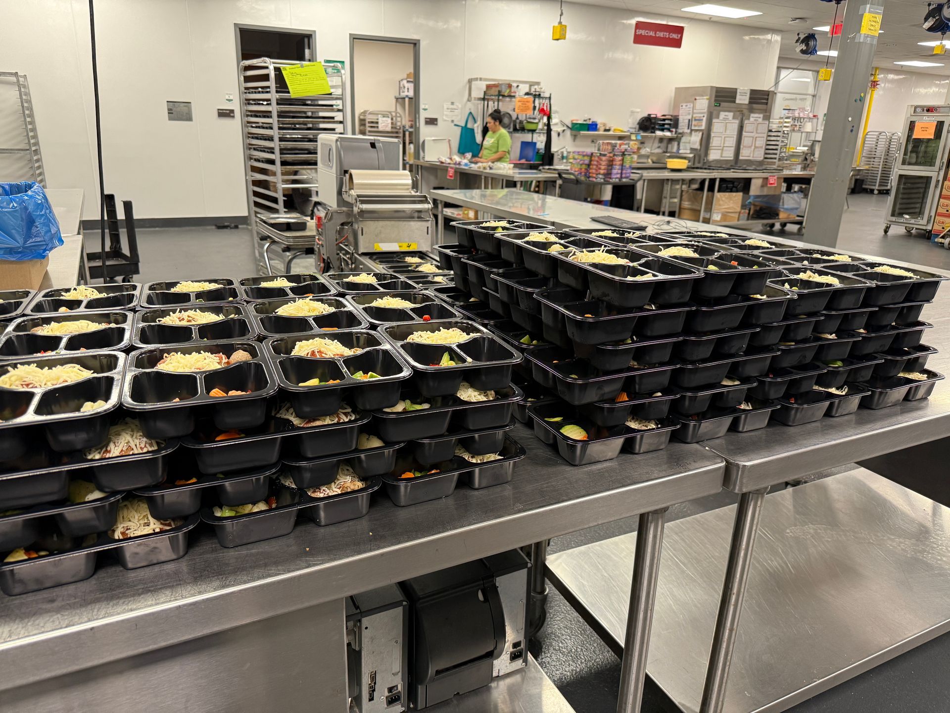 food containers stacked at the food bank after being packaged