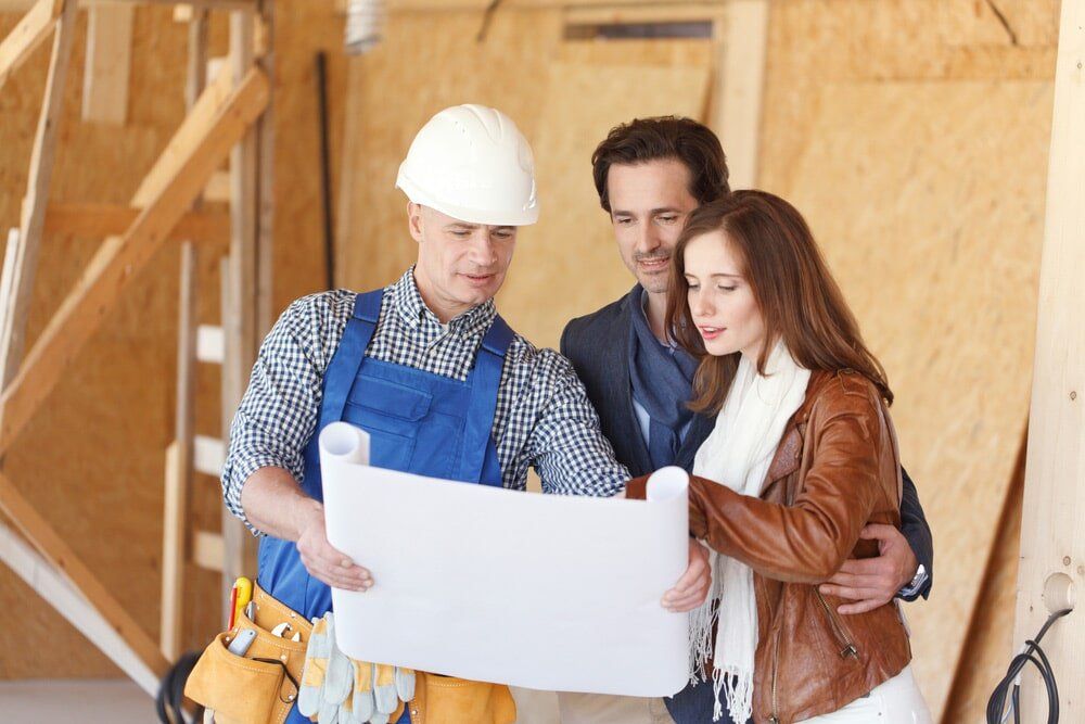 Worker and Couple Talking About the Floor Plan — Renovation in Woolgoolga, NSW