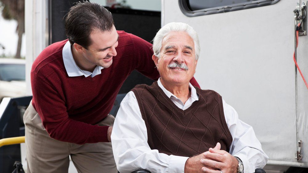 Smiling Old Man With Van Behind — Forsyth, NC — Safe Ride Transportation