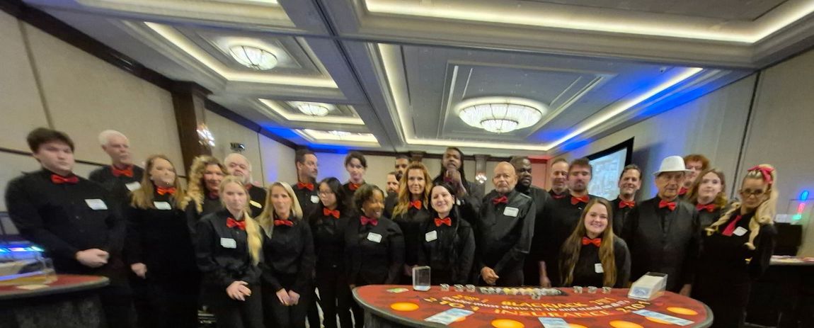 A large group of people are posing for a group photo