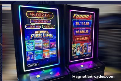 Two slot machines are sitting next to each other.