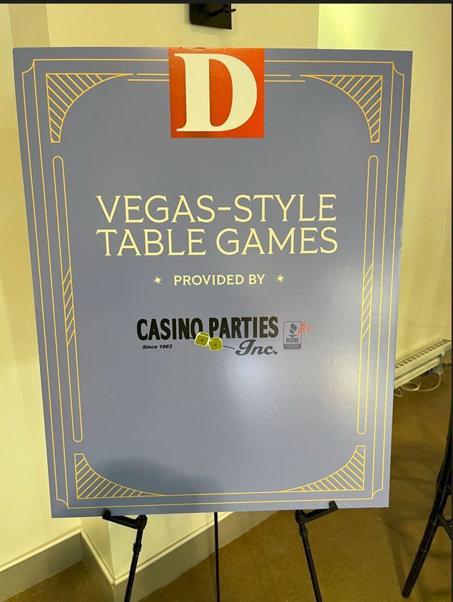 A sign that says vegas style table games on it