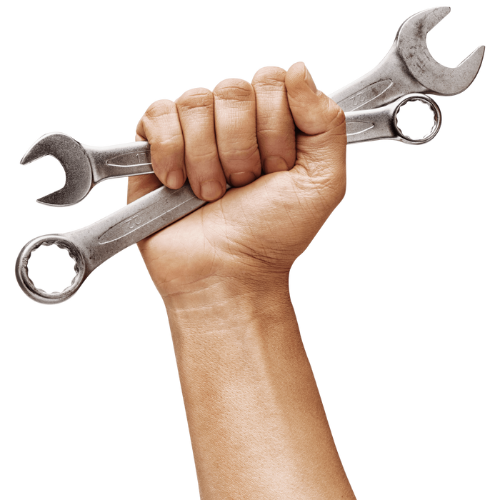 Man's hand holds a spanners isolated. Close up. High resolution product