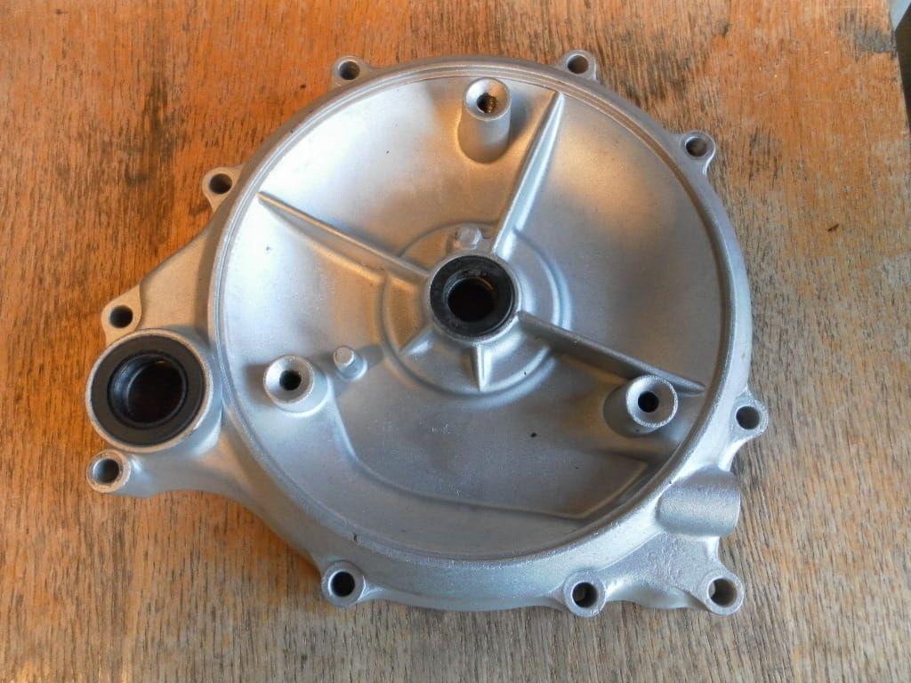 Koppelingsdeksel , clutchcover	cb750 sohc	11342-300-050 , 11342-300-060(gestraald)