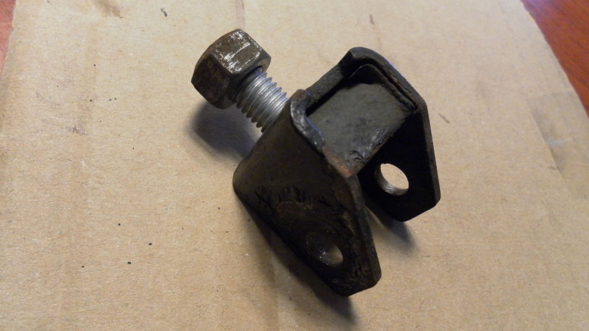 houder passagiers voetsteun rechts	k75 	46711457476