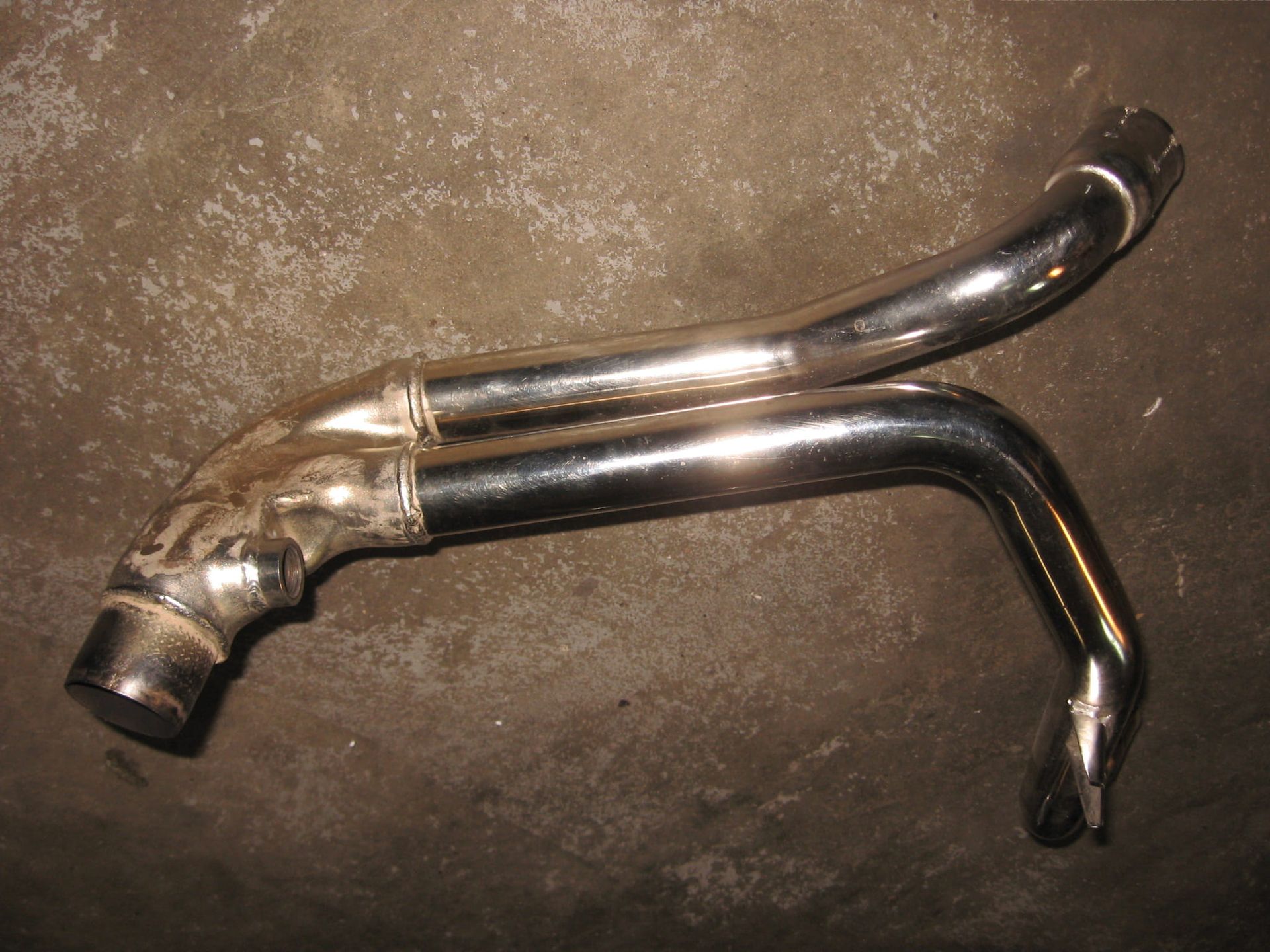 Uitlaat tussenstuk 1-2 met aansluiting co sensor// Speed triple 1050 2006- 2010 , T2200337