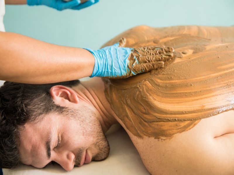 Cancer patient getting a detoxifying back treatment