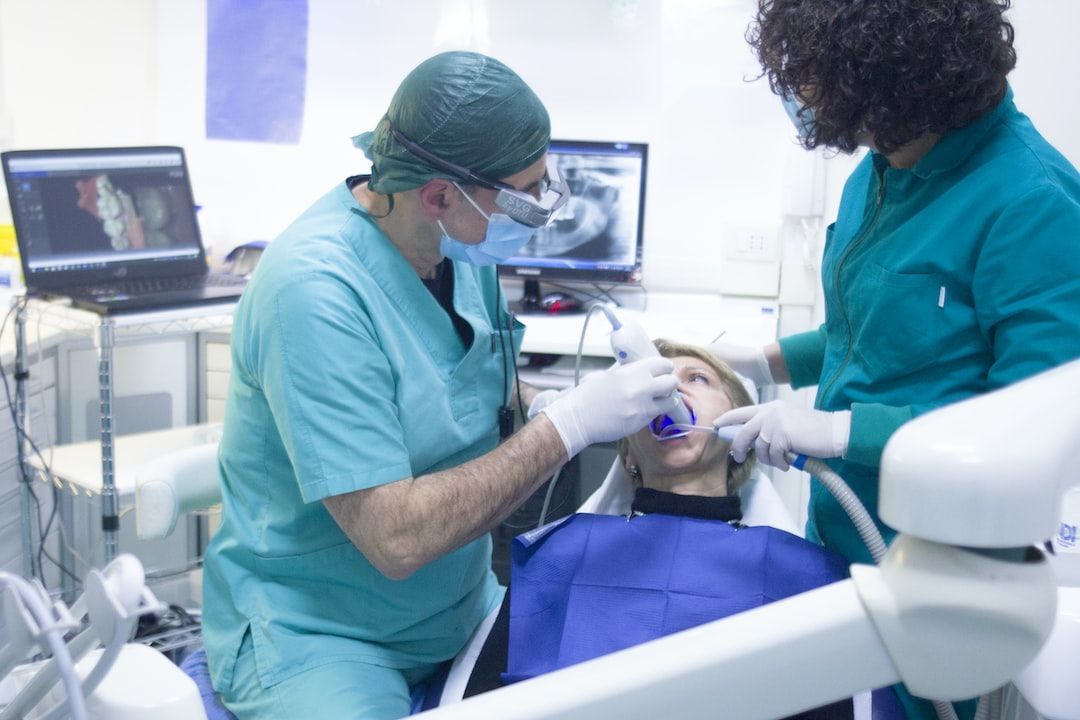 Dentist working on patient's mouth