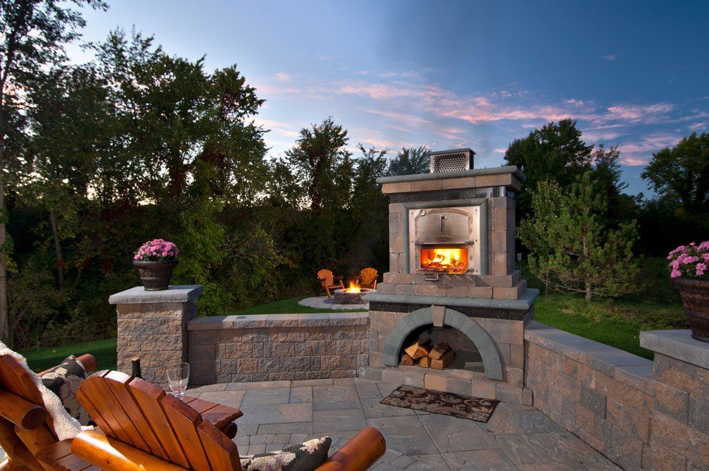 Outdoor fire pits and kitchens are popular upgrades for new home builders