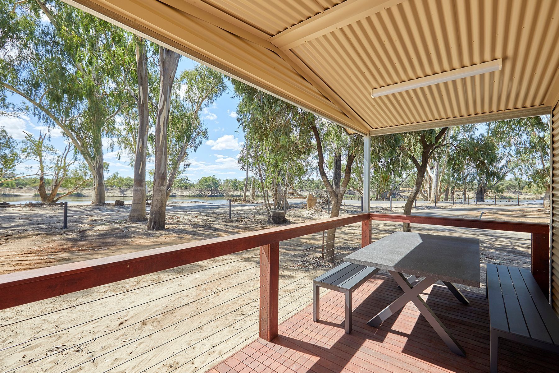 Apex Riverbeach Holiday Park cabin with deck