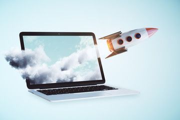Laptop with rocket shooting out of the screen.