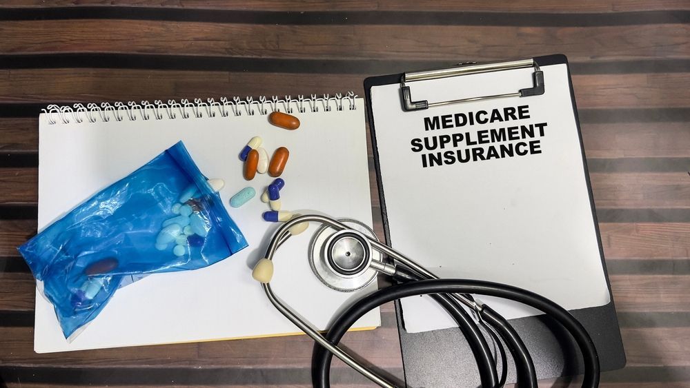 A stethoscope rests on a sticky note that says 