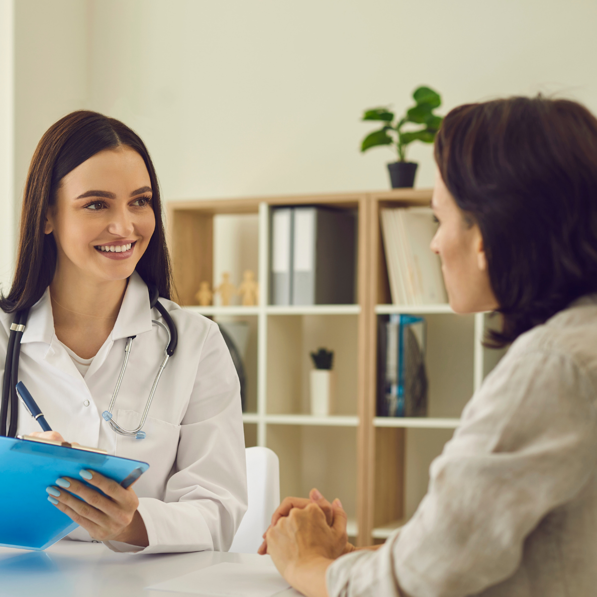 Clinician consulting with patient