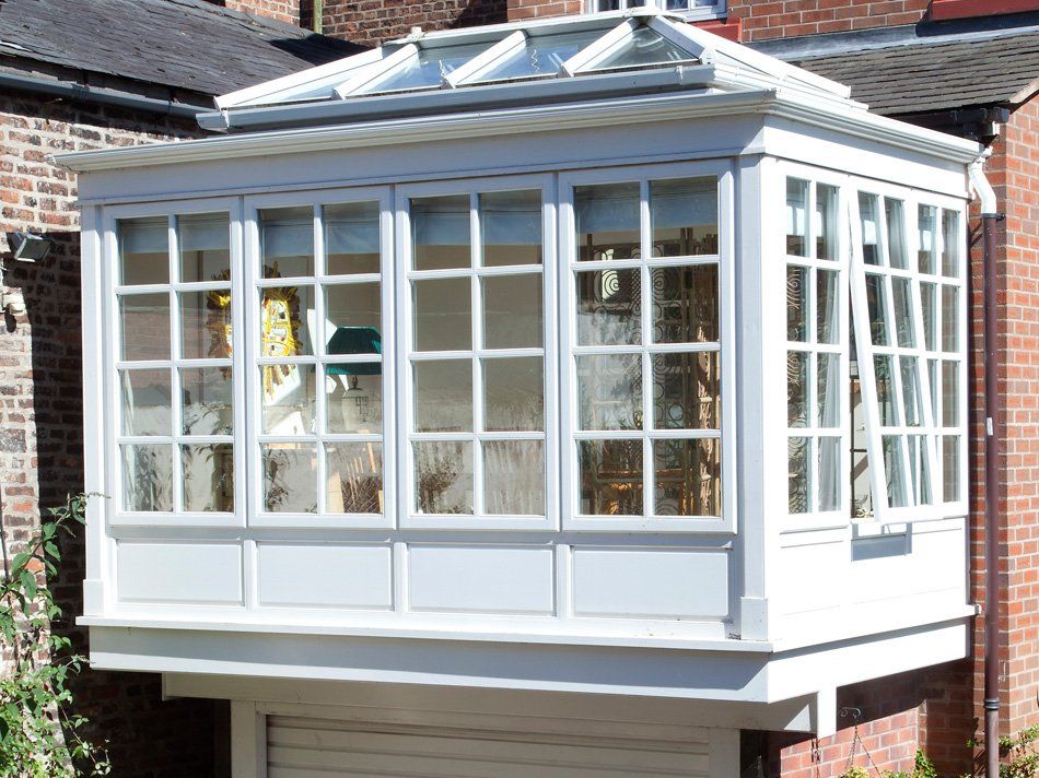 White Coloured Conservatory Home Addition Installed by Holt Orangeries