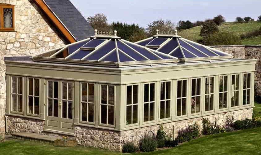 Aerial View of Green Home Conservatory Attached to Stone House from Holts Orangeries