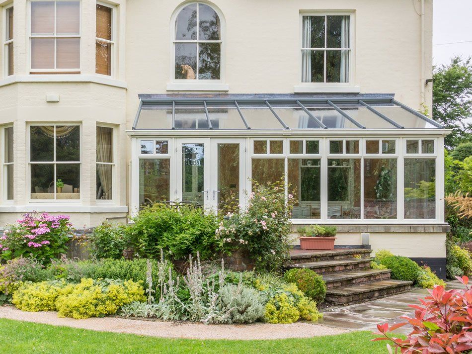 Eggshell Coloured Glass Conservatory Home Addition Installed by Holt Orangeries