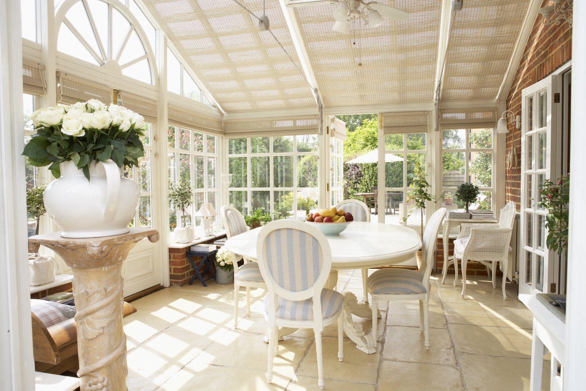 Modern Conservatory with Antique-Inspired Decor
