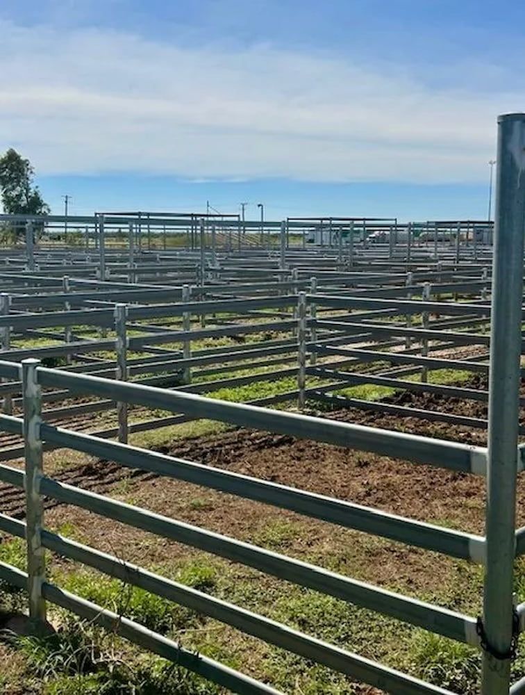 A Fenced In Area With A Lot Of Fences In It — PH Davie in Mount Isa, QLD