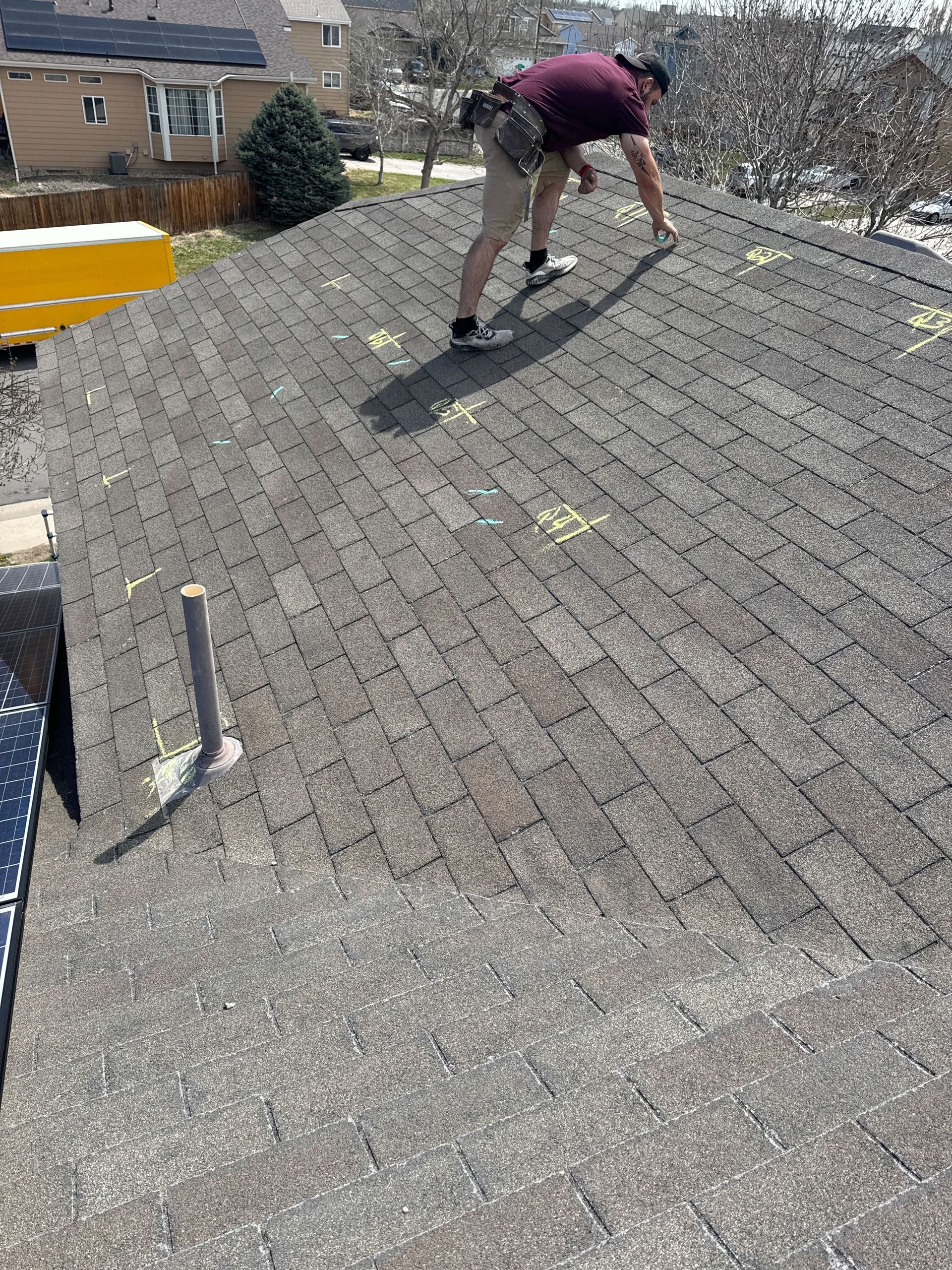 Precision Exteriors doing a roof inspection