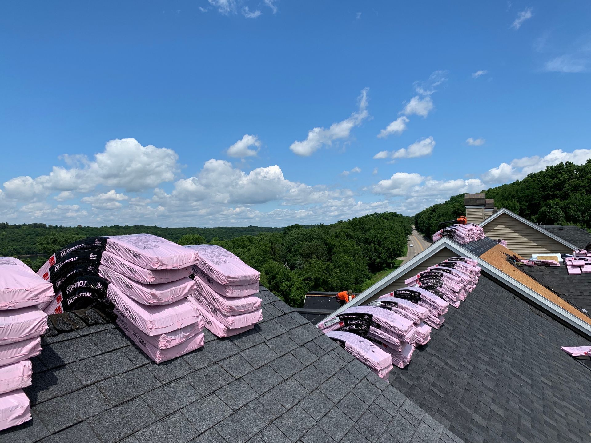 Precision Exteriors crew restoring a multi-unit roof in the Denver metro