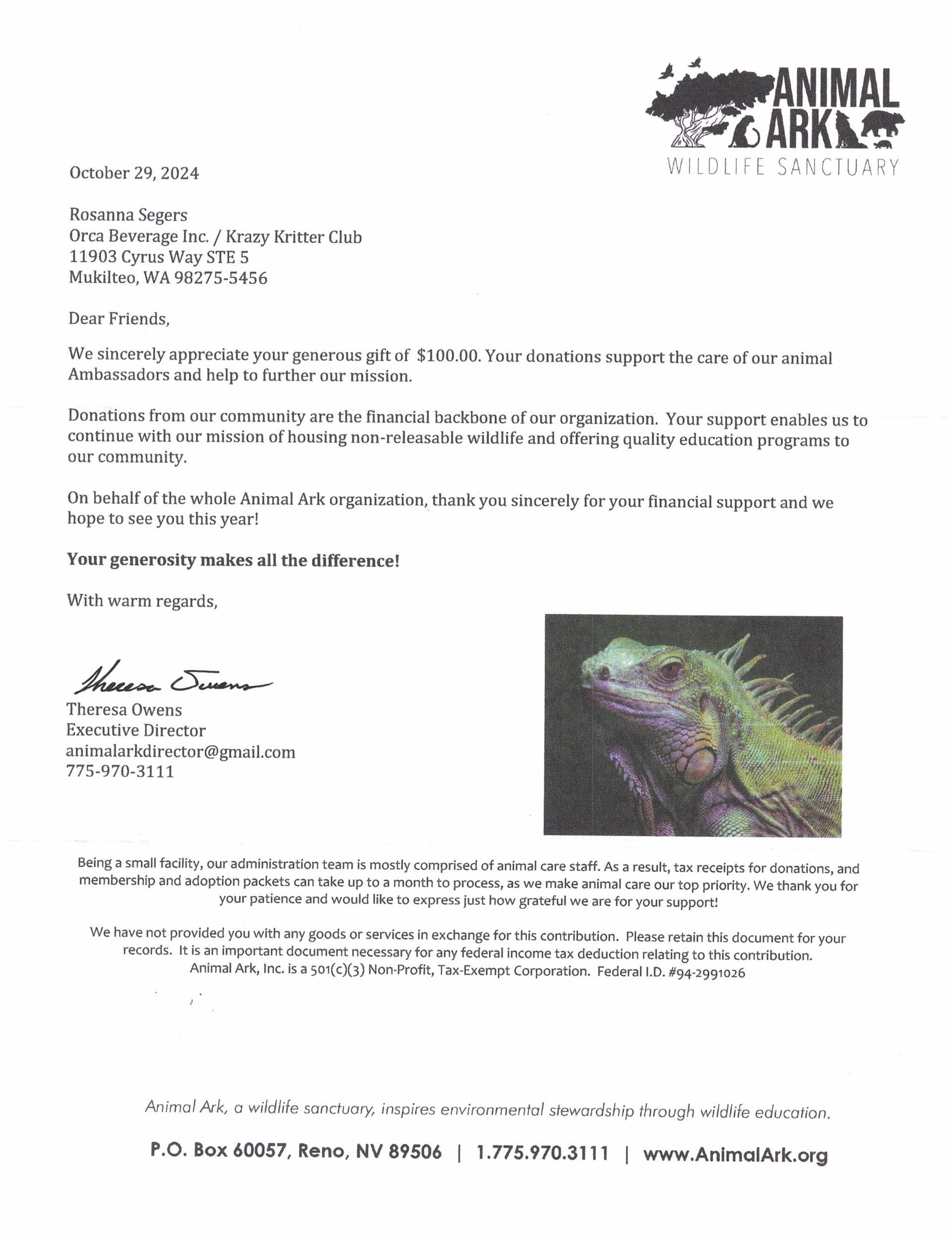 A letter with a picture of an iguana on it.