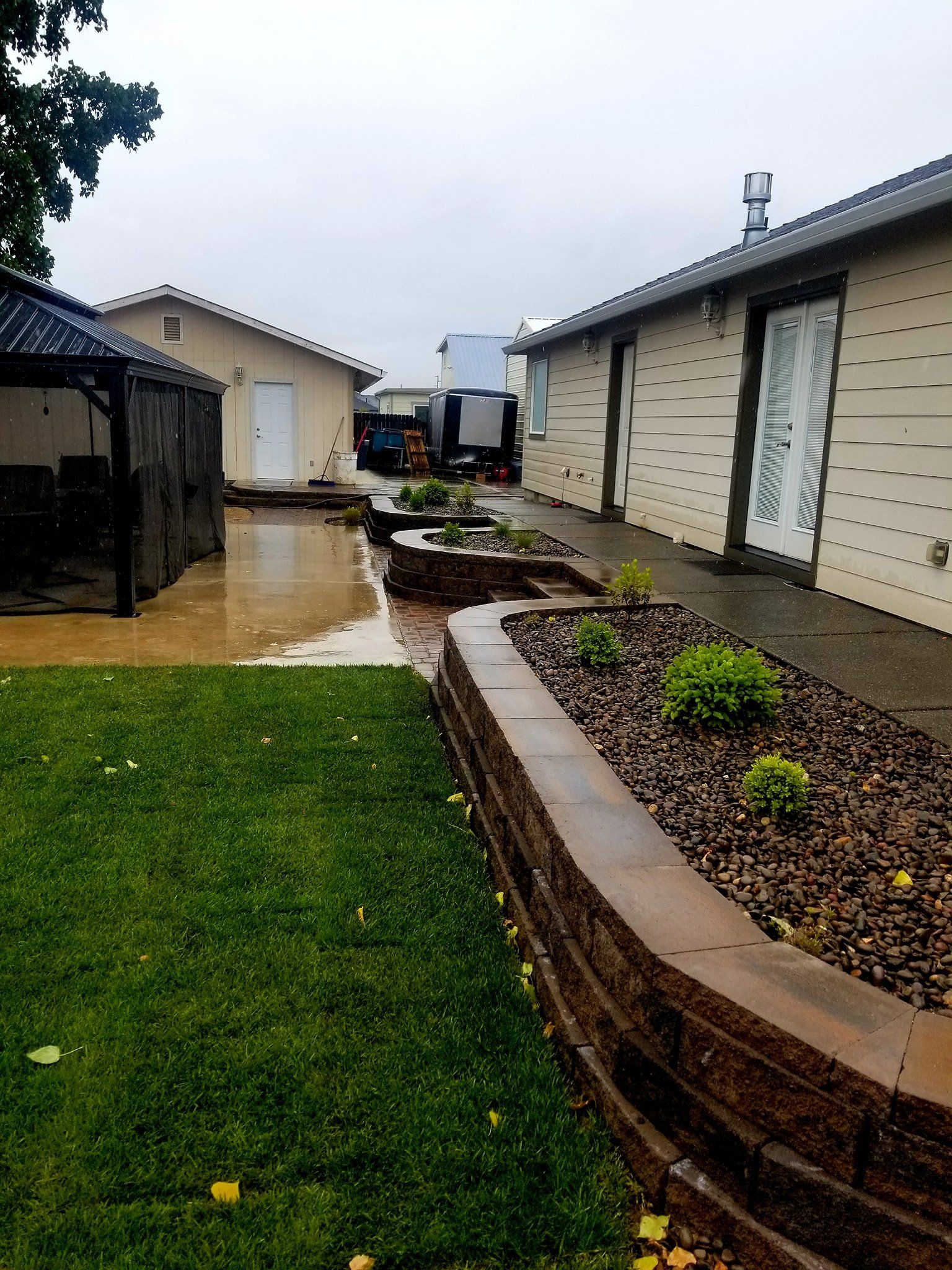 Fence Plants In Front Of The House — Medford, Oregon — Springfall Landscape & Maintenance