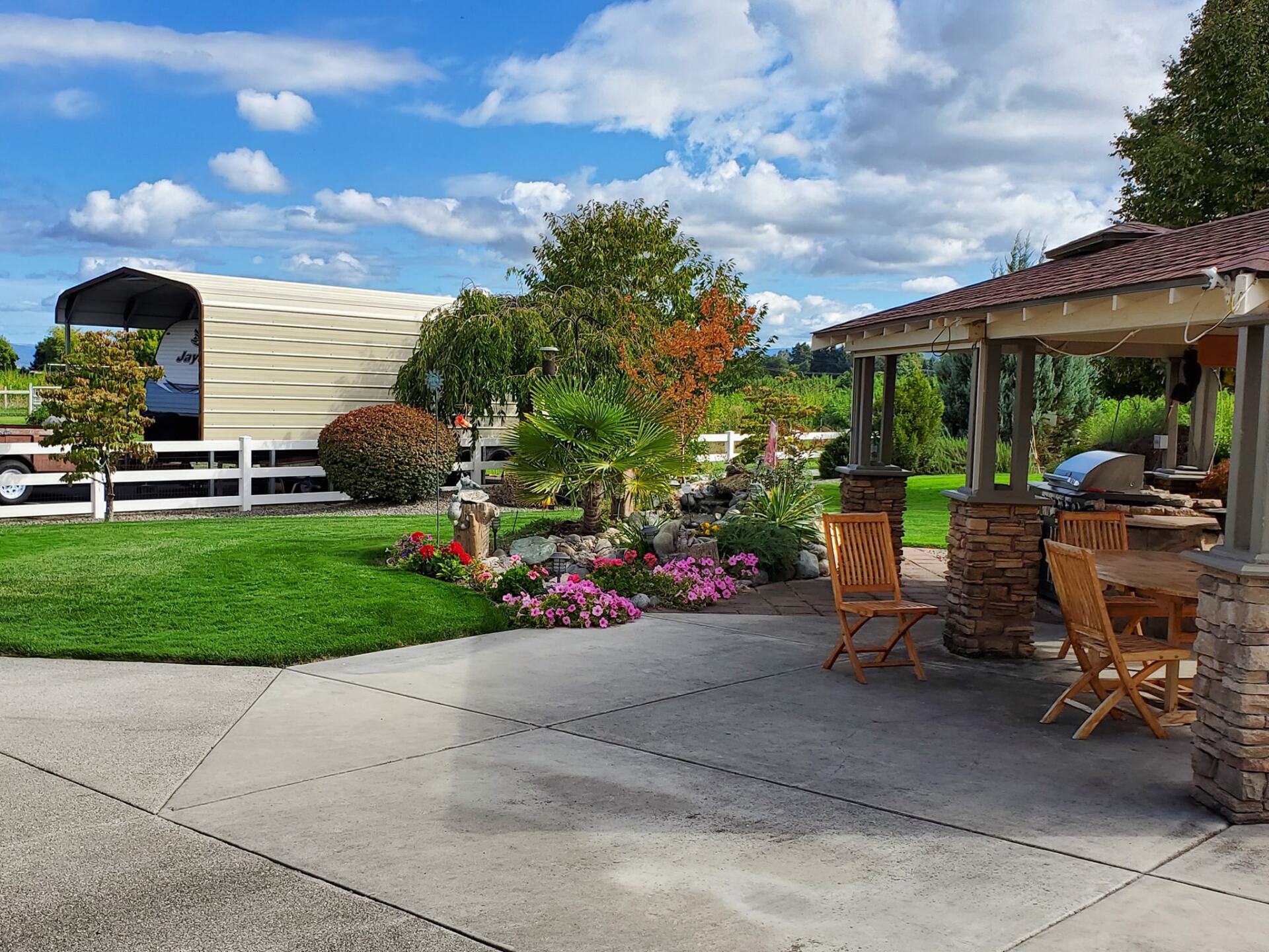 Flowers Outside The House — Medford, Oregon — Springfall Landscape & Maintenance