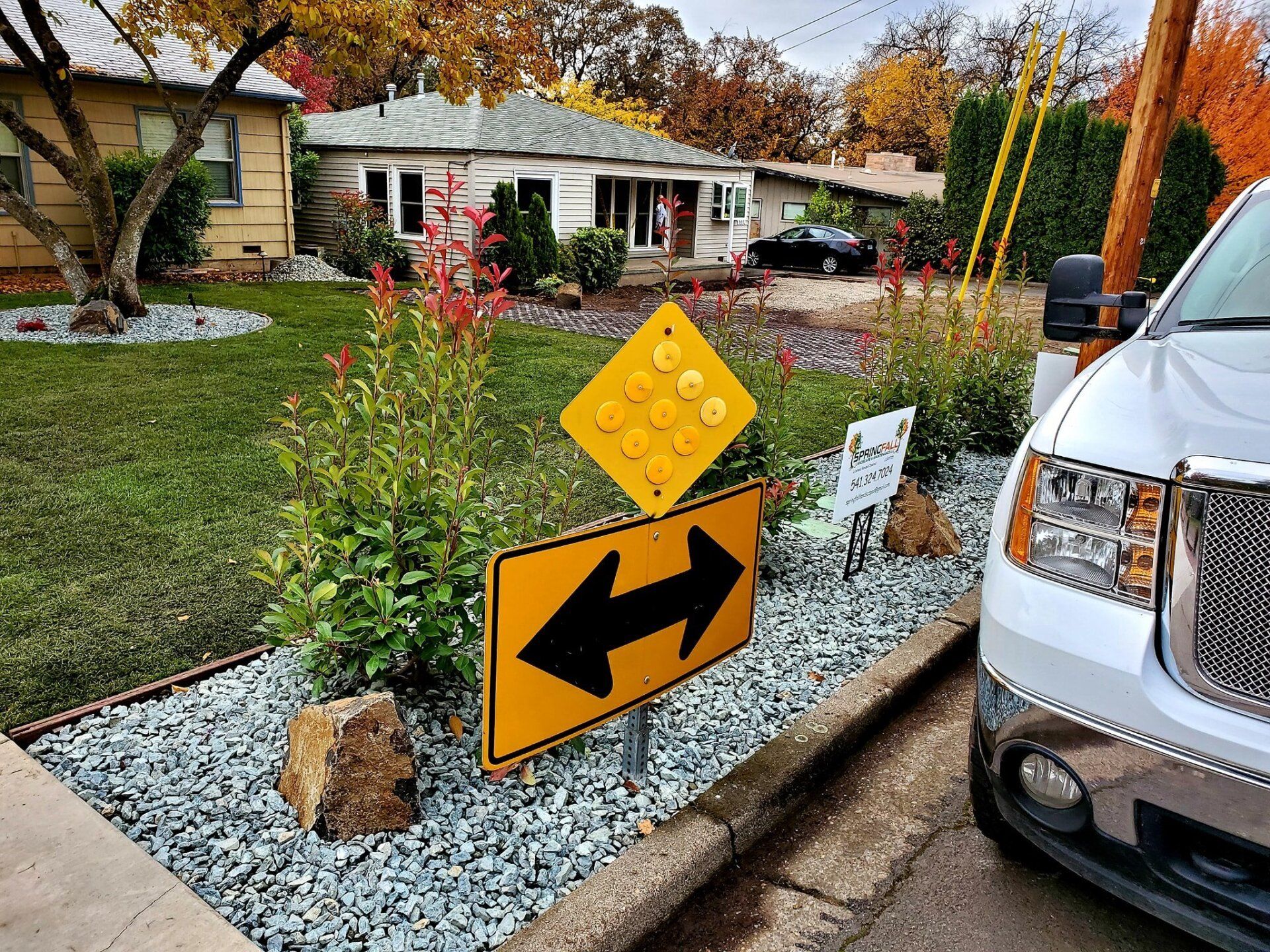 Landscape With Sign Board Arrow — Medford, Oregon — Springfall Landscape & Maintenance