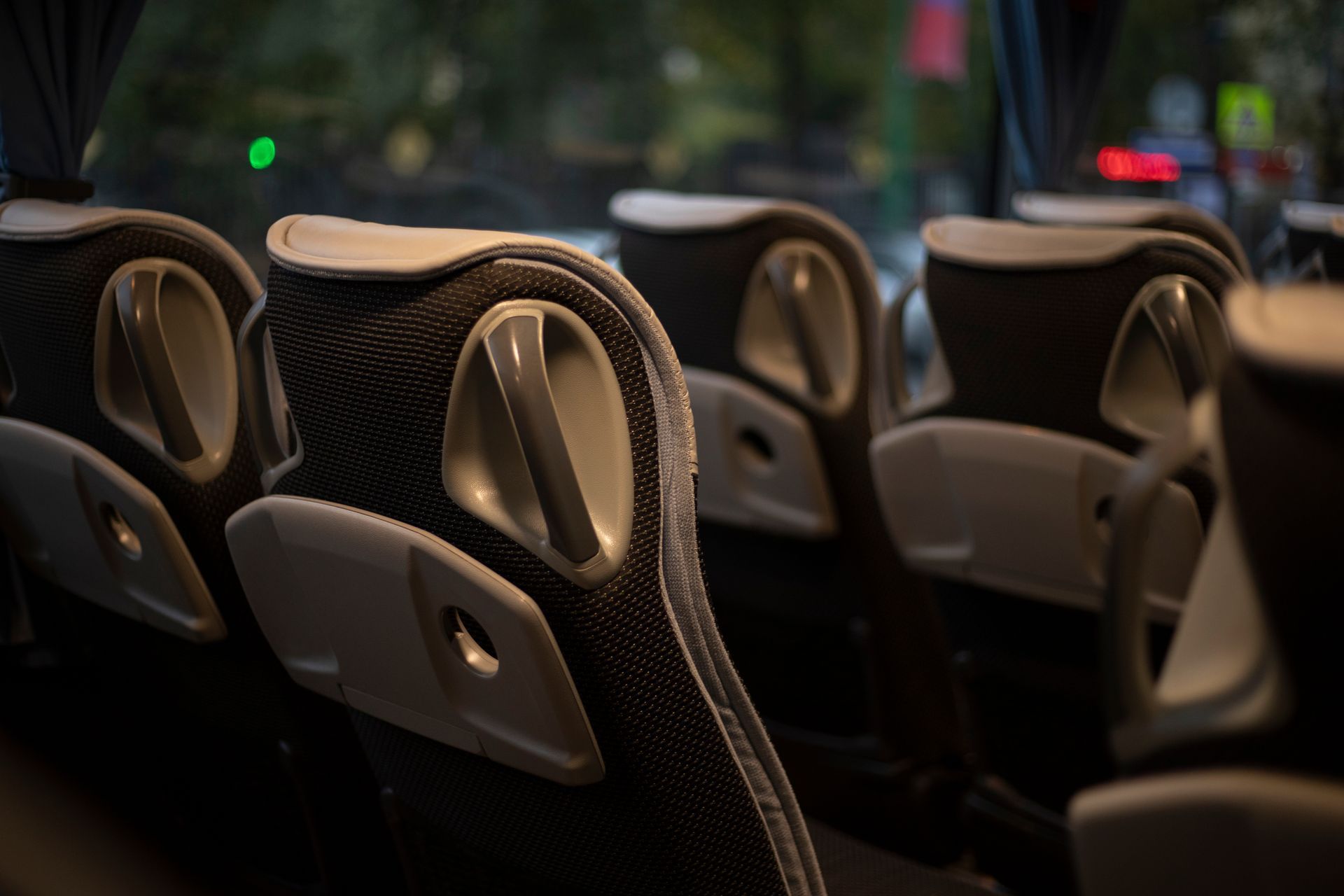 Rows of passenger seats inside a bus