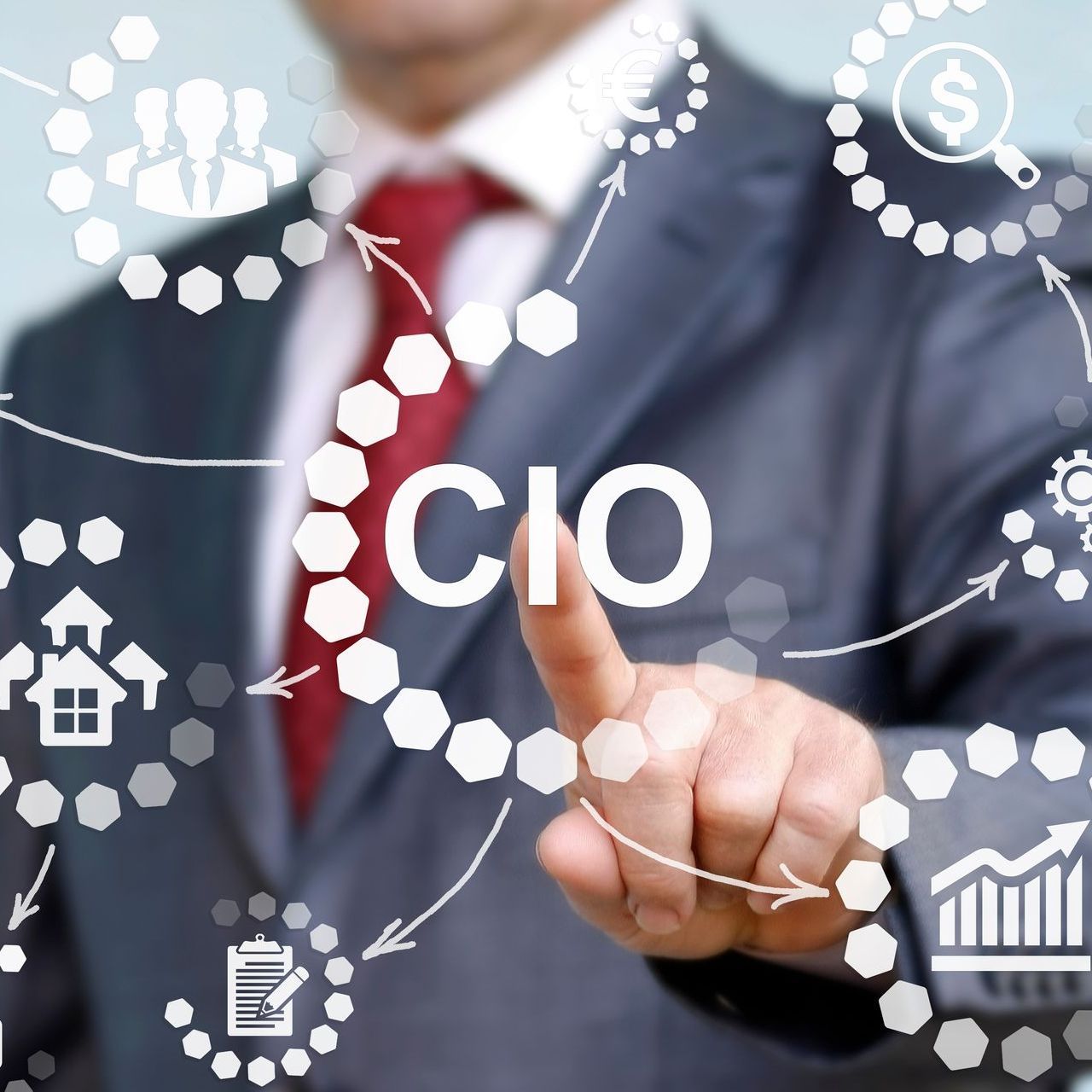 A man in a suit and tie is pointing at the word cio