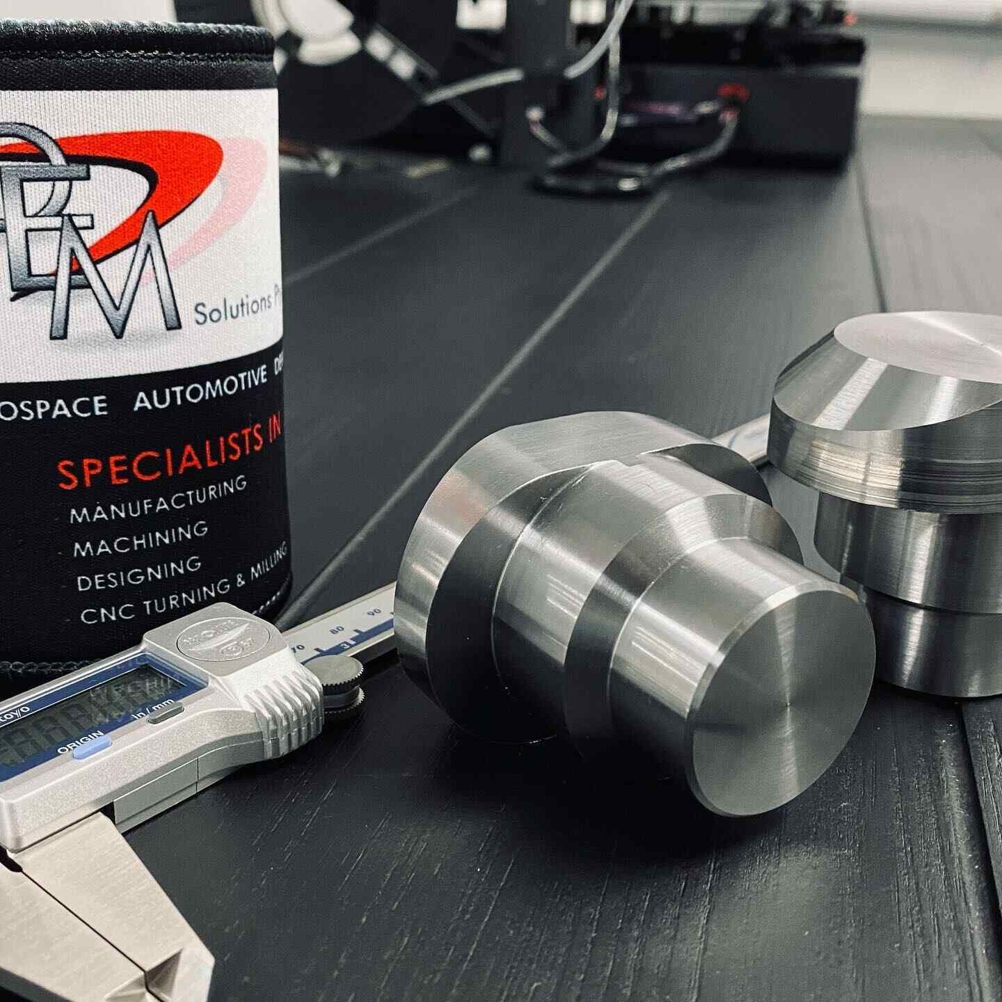 A Bottle Of Space Automotive Specialists On A Table — D.E.M Solutions Pty Ltd In Caboolture, QLD